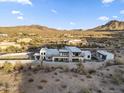 Modern desert home with expansive views and a private pool at 9520 S Krista W Dr, Goodyear, AZ 85338