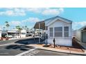 White mobile home exterior, situated in a mobile home community at 158 Limestone Dr, Apache Junction, AZ 85119