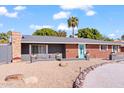 Charming mid-century home with updated landscaping at 1506 E Oregon Ave, Phoenix, AZ 85014