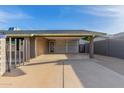Single story home with attached carport at 3033 E Sierra St, Phoenix, AZ 85028