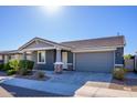 New construction home with gray exterior and two-car garage at 735 E Marblewood Way, Phoenix, AZ 85048
