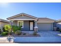 New construction home with gray exterior and two-car garage at 735 E Marblewood Way, Phoenix, AZ 85048