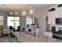 Spacious kitchen with granite countertops and stainless steel appliances at 3722 E Haflinger Rd, San Tan Valley, AZ 85140