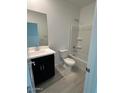 Clean bathroom with a bathtub, shower, and dark vanity at 16951 W Fetlock Trl, Surprise, AZ 85387