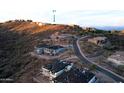 Aerial view of a residential lot in a luxury community with mountain views and nearby homes under construction at 10722 N Skyline Dr, Fountain Hills, AZ 85268