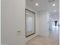 Bright entryway with a large mirror and tile flooring at 1619 E Joelle Dr, Casa Grande, AZ 85122