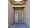 Inviting front entryway with a security door and decorative glass at 11515 W Sandsnake Ct, Surprise, AZ 85378