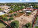 Aerial view showing property lines of large lot with existing home at 7026 E Warner Rd, Tempe, AZ 85284