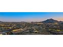 Nighttime aerial view showing home and mountain range at 4880 E Lone Mountain N Rd, Cave Creek, AZ 85331