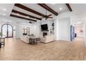 Spacious living area with wood beams and tile floors at 2346 E Sanoque Ct, Gilbert, AZ 85298