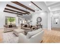 Open living space featuring comfortable seating and wood beams at 2346 E Sanoque Ct, Gilbert, AZ 85298
