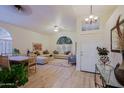 Bright living room with L-shaped sofa and wood floors at 3846 N Kings Peak --, Mesa, AZ 85215