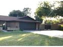 House exterior showcasing a large front yard and driveway at 10517 W Earll Dr, Avondale, AZ 85392