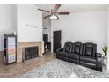 Living room featuring a fireplace and a relaxing seating area at 3030 S Alma School Rd # 12, Mesa, AZ 85210