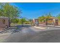 Gated community entrance with signage at 3525 N Carlton St, Buckeye, AZ 85396