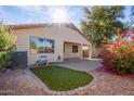 Backyard with patio and artificial turf at 10768 W Citrus Grove Way, Avondale, AZ 85392