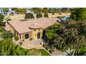 Impressive estate home with a circular driveway and manicured landscaping at 2912 E Vaughn Ave, Gilbert, AZ 85234
