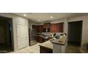 Modern kitchen with granite countertops and stainless steel appliances at 25422 W Maldonado Ct, Buckeye, AZ 85326