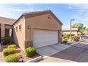 House exterior, showing garage and landscaping at 846 N Pueblo Dr # 113, Casa Grande, AZ 85122