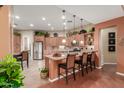 Spacious kitchen with island and stainless steel appliances at 12832 W Pinnacle Vista Dr, Peoria, AZ 85383