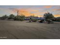 Large front yard with sunset views and desert landscape at 31711 N 164Th St, Scottsdale, AZ 85262