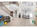 Spacious living room with high ceilings and a tree decal at 4102 S 186Th Ave, Goodyear, AZ 85338