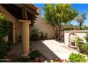 Peaceful courtyard with a fountain and stone flooring at 6701 N Scottsdale Rd # 20, Scottsdale, AZ 85250
