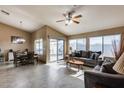 Bright dining area with tile floor and view to backyard at 15547 W Magnolia St, Goodyear, AZ 85338