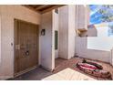 Private entry with security door leading to a small patio at 1342 W Emerald Ave # 335, Mesa, AZ 85202