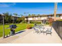Community patio with BBQ grill and seating area at 4701 N 68Th St # 248, Scottsdale, AZ 85251