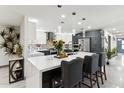 Modern kitchen with white quartz countertops and stainless steel appliances at 1101 N Christa Way, Tolleson, AZ 85353