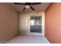 Private condo entry with security door and window at 1340 N Recker Rd # 131, Mesa, AZ 85205