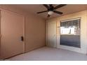 Private condo entry with security door and window at 1340 N Recker Rd # 131, Mesa, AZ 85205