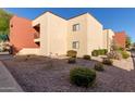 Building exterior showing landscaping and building features at 1340 N Recker Rd # 140, Mesa, AZ 85205