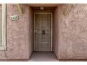 Condo entry with a security door and address number 8428 at 8428 N 33Rd Dr, Phoenix, AZ 85051