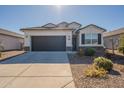 One-story home with a two-car garage and landscaped front yard at 4601 W Lemon Ave, Coolidge, AZ 85128