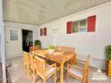 Patio with wooden dining set at 303 S Recker Rd # 175, Mesa, AZ 85206