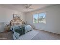 Cozy bedroom featuring a comfortable bed and ample natural light at 7820 E Camelback Rd # 209, Scottsdale, AZ 85251