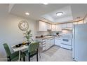 Clean kitchen with white cabinetry and modern appliances at 7820 E Camelback Rd # 209, Scottsdale, AZ 85251
