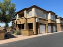 Two-story townhome with attached garage at 1445 E Broadway Rd # 120, Tempe, AZ 85282