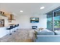 Open concept kitchen and living area with modern appliances and city view at 7120 E Kierland Blvd # 416, Scottsdale, AZ 85254