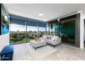 Spacious living area with floor to ceiling windows and city view at 7120 E Kierland Blvd # 416, Scottsdale, AZ 85254