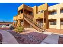 Apartment building entrance with stairs and landscaping at 11640 N 51St Ave # 250, Glendale, AZ 85304