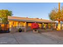 Single story home with a well-maintained front yard and landscaping at 2746 W Turney Ave, Phoenix, AZ 85017