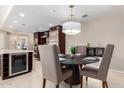 Kitchen features a round dining table with four chairs at 7137 E Rancho Vista Dr # 2002, Scottsdale, AZ 85251