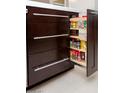 Pull out spice rack in modern kitchen cabinetry at 7137 E Rancho Vista Dr # 2002, Scottsdale, AZ 85251