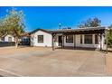 Updated single story home with carport and front yard at 1818 E Monterey Way, Phoenix, AZ 85016