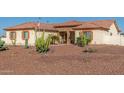 One-story house with a stone facade and desert landscaping at 30124 W Mckinley St, Buckeye, AZ 85396