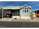Quaint single wide mobile home with carport at 7750 E Broadway Rd # 776, Mesa, AZ 85208