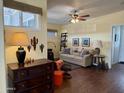 Cozy living room features hardwood floors and comfortable seating at 7750 E Broadway Rd # 776, Mesa, AZ 85208